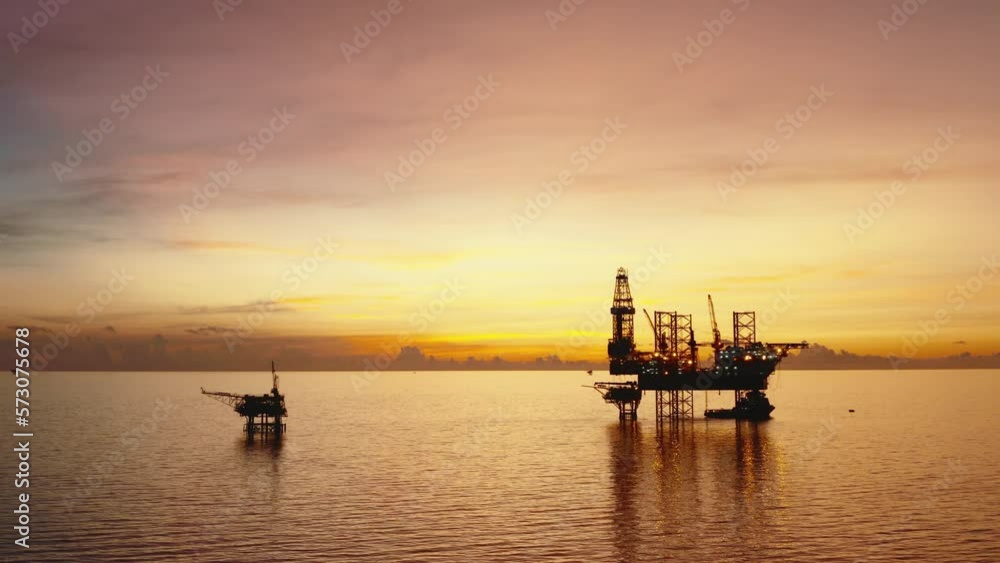 Jack up drilling rig and production platform in the middle of the ocean at sunrise time
Jack up drilling rig and production platform in the middle of the ocean at sunrise time