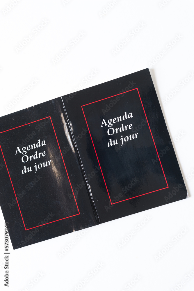 retro agenda cover with bilingual text on a white background retro agenda cover with bilingual text on a white background