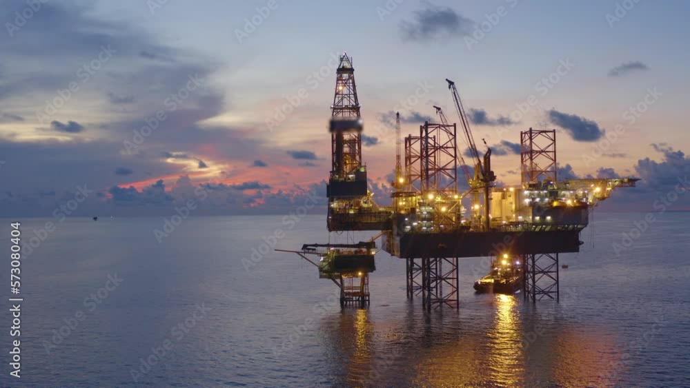 Jack up drilling rig and production platform in the middle of the ocean at sunrise time
Jack up drilling rig and production platform in the middle of the ocean at sunrise time