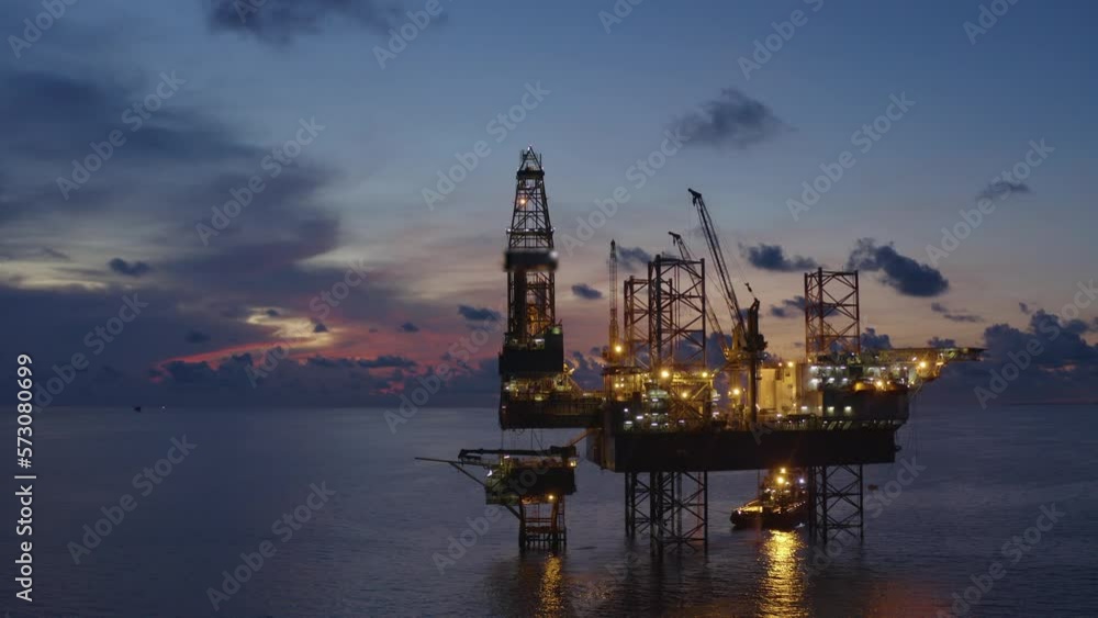 Jack up drilling rig and production platform in the middle of the ocean at sunrise time
Jack up drilling rig and production platform in the middle of the ocean at sunrise time