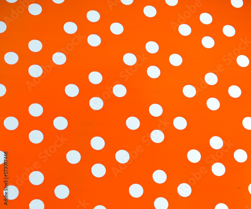 abstract background with orange panel and dots - close up with macro lens, hence photos have particular focus point