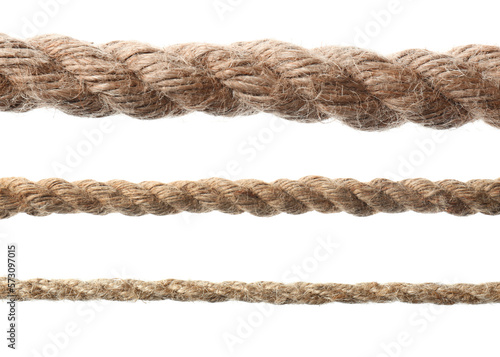 Set of durable hemp ropes on white background