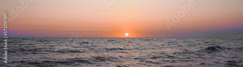 Beautiful panorama of sky over sea at sunset. Banner design © New Africa