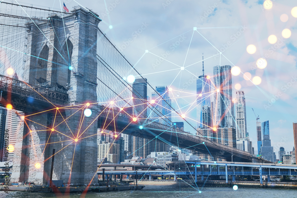 Fototapeta premium Brooklyn bridge with New York City Manhattan, financial downtown skyline panorama at day time over East River. Social media hologram. Concept of networking and establishing new people connections
