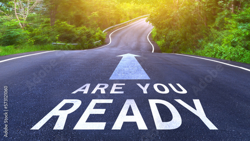 Are you ready written on the middle of the asphalt curve road. Are you ready Write on the road in the middle of the empty asphalt road