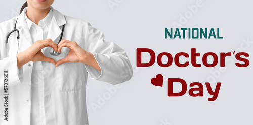 Cardiologist making heart w...