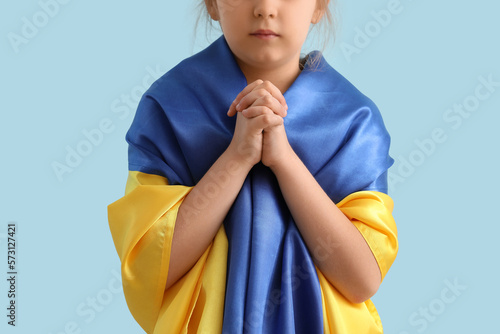 Little girl with flag of Uk...