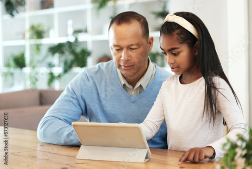 Family, grandfather and kid with tablet, happy with technology and streaming online with app. Love, care with man and girl watching cartoon together, happiness and bonding with wifi at home