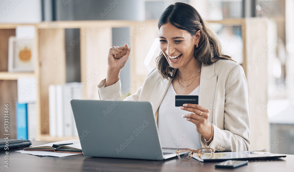 Finance, credit card and success with woman and laptop in office for savings, investment or online shopping sale. Winner, fintech and ecommerce with customer and website for deal, payment or offer Finance, credit card and success with woman and laptop in office for savings, investment or online shopping sale. Winner, fintech and ecommerce with customer and website for deal, payment or offer