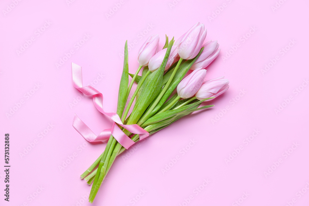 Bouquet of beautiful tulips on pink background. Women's Day celebration Bouquet of beautiful tulips on pink background. Women's Day celebration