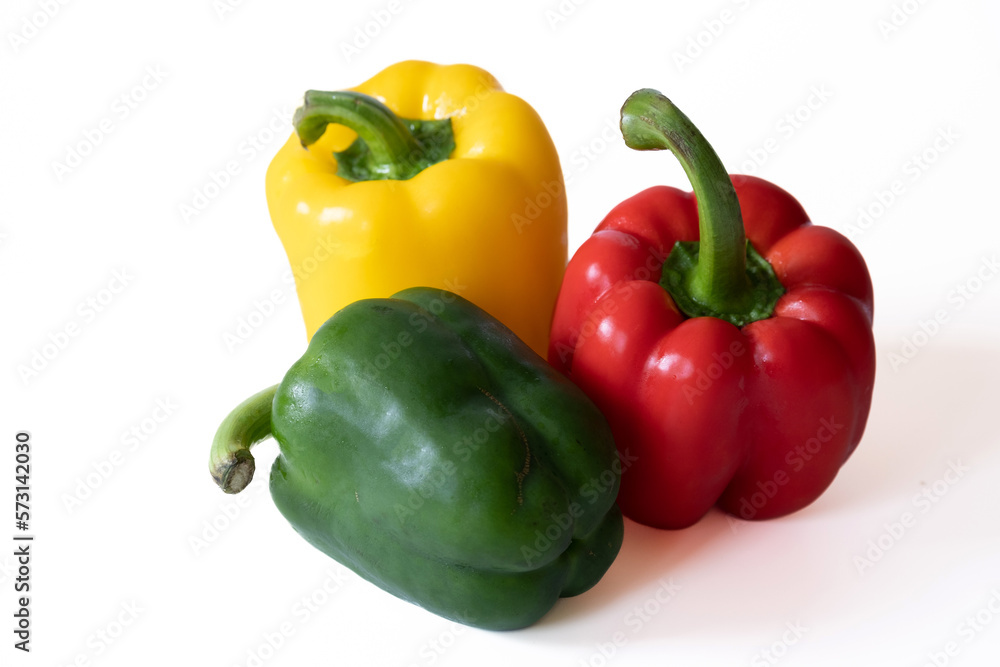 Sweet bell pepper (red,green and yellow) with water drops isolated on white background. Sweet bell pepper (red,green and yellow) with water drops isolated on white background.