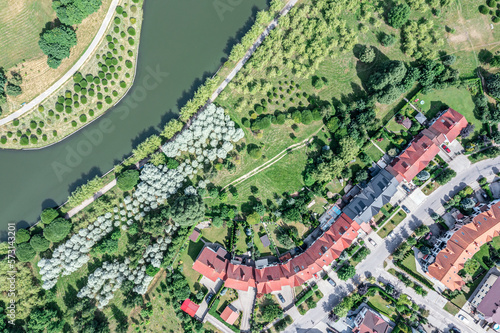 aerial top view of city residential area of private houses along the river © Mr Twister