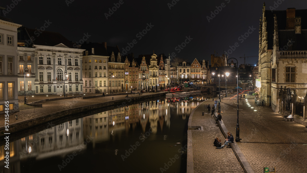 Cityscape at night and water reflection in Gent, Belgium in January 2023
