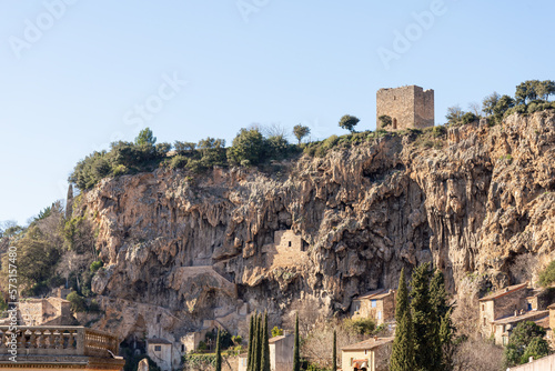 Cotignac is a French village in Provence. It is famous for its troglodyte dwellings that are carved into tufa cliffs covered with large stalactites, and its two feudal towers from 1033.
 photo