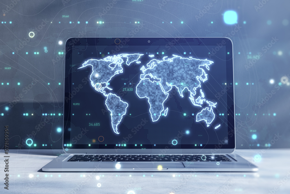 Close up of laptop computer on desktop with glowing map hologram on blurry tech background. Global world and perspective concept. Double exposure. Close up of laptop computer on desktop with glowing map hologram on blurry tech background. Global world and perspective concept. Double exposure.