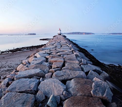 Spring Point lighthouse stands guard at the entrance of Portland harbor, Maine. photo