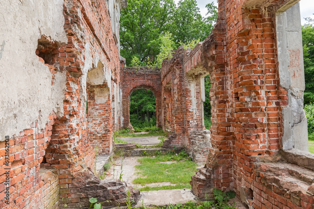 Ruins of old palace, partially destroyed brick walls of corridor