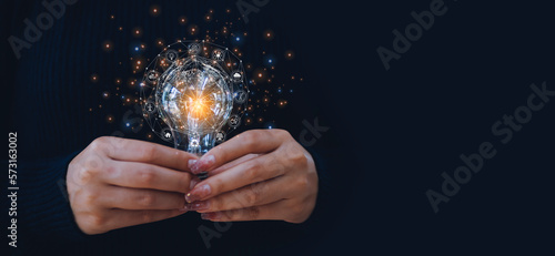 Enhancing global business capabilities , Ai, Human hands holding light bulb, Science innovation with network connection, Digital Innovative technology.