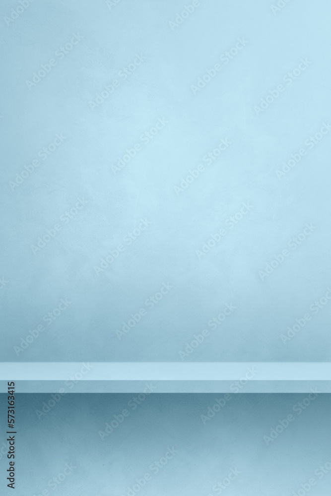 Empty shelf on a light blue concrete wall. Background template. Vertical mockup Empty shelf on a light blue concrete wall. Background template. Vertical mockup