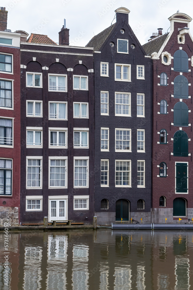View of Dutch architecture. Houses in Amsterdam. Netherlands. Vertically. 