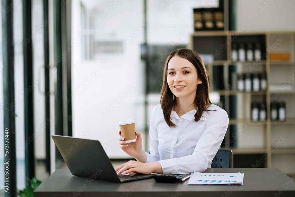 Asian businesswoman working in the office with working notepad, tablet and laptop documents . Asian businesswoman working in the office with working notepad, tablet and laptop documents .