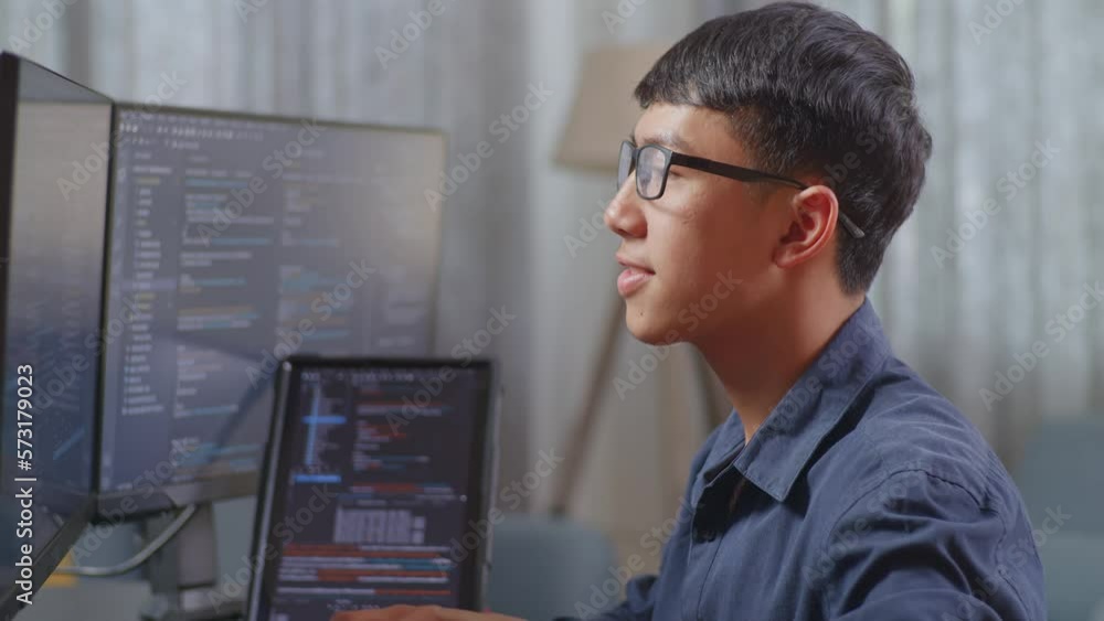 Close Up Of Asian Boy Programmer With A Tablet Creating Software Engineer Developing App, Program, Video Game On Desktop Computer At Home. Terminal With Coding Language
Close Up Of Asian Boy Programmer With A Tablet Creating Software Engineer Developing App, Program, Video Game On Desktop Computer At Home. Terminal With Coding Language