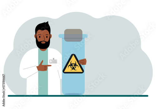 A male doctor or scientist is holding a test tube with a biohazard or virus warning label on it. Biological hazard.