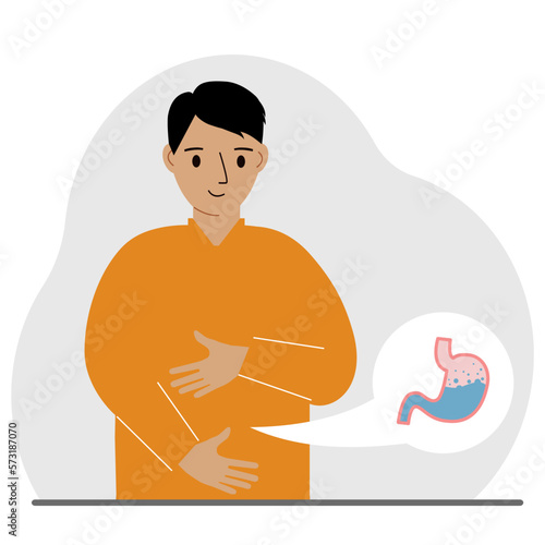 The concept of a healthy stomach. The man holds her stomach with both hands. A healthy stomach or proper digestion.