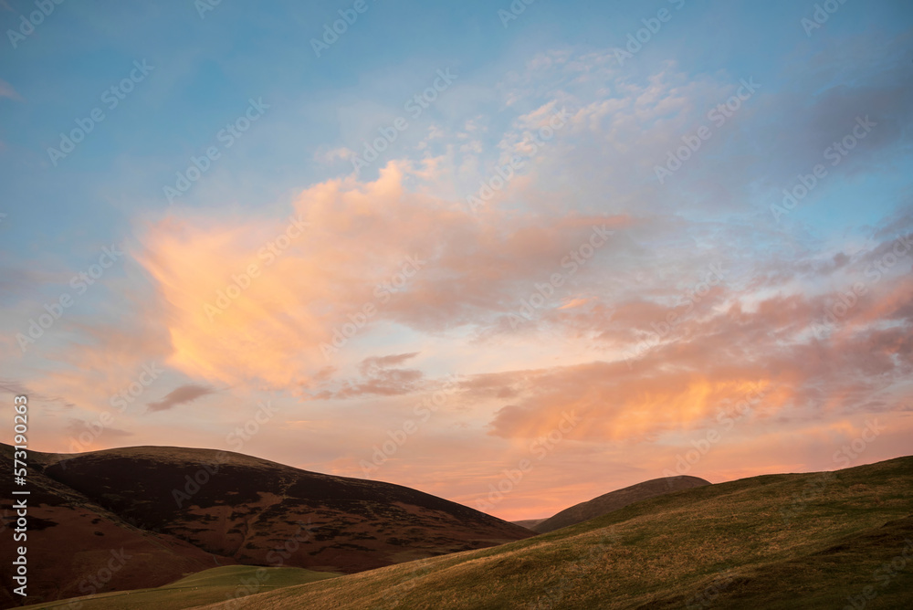Beautiful colorful Winter sunset landscape over Latrigg Fell in Lake District
