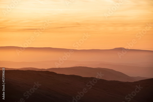 Lovely Winter landscape view from Red Screeds across misty layers of mountains towards the East