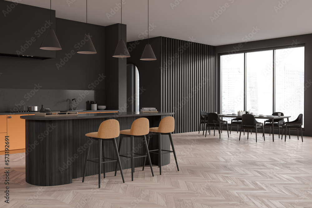 Corner view on dark kitchen room interior with dining table Corner view on dark kitchen room interior with dining table