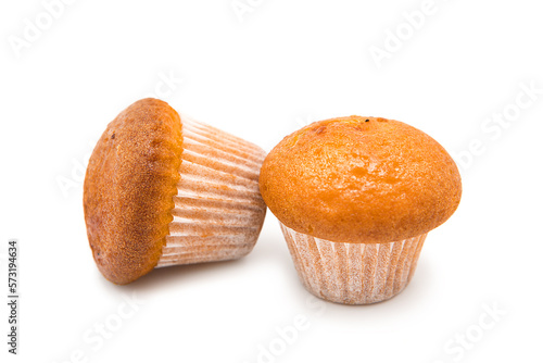 Freshly baked muffins isolated on white background.