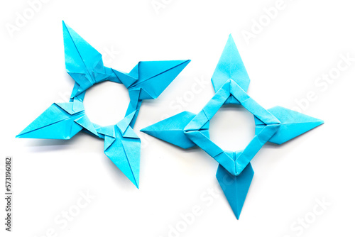 blue paper star on a white background. origami. papercraft. needlework