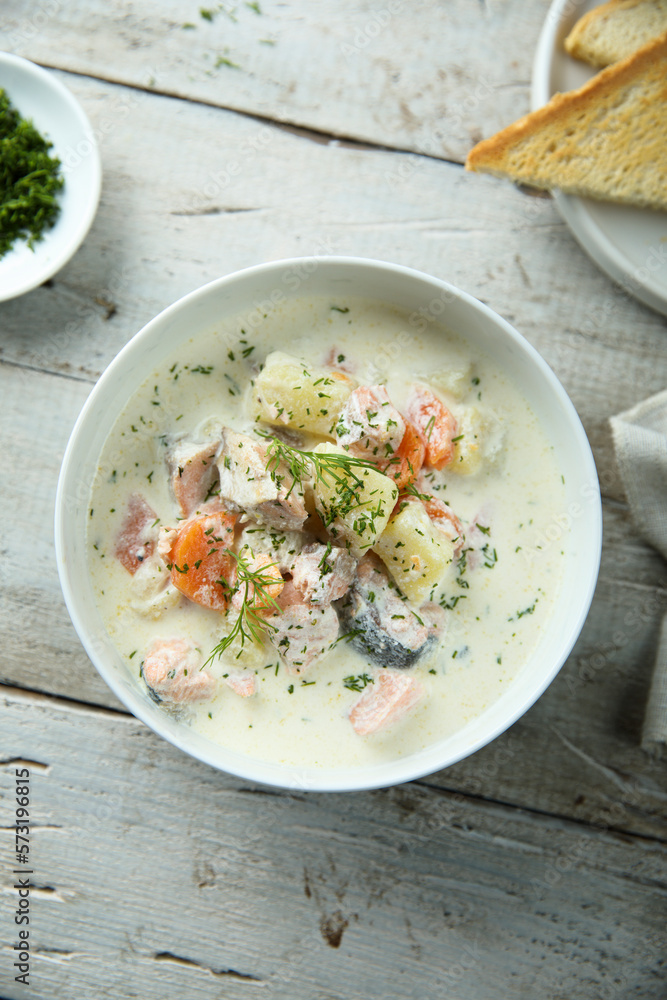 Traditional fish soup with vegetables and cream Traditional fish soup with vegetables and cream