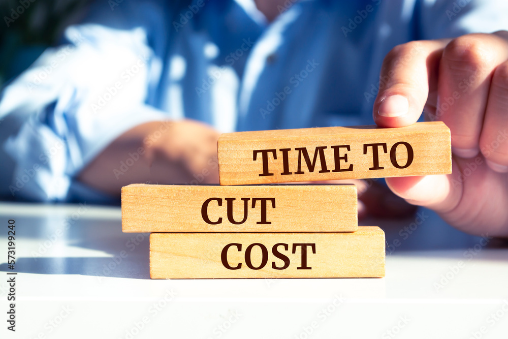 Close up on businessman holding a wooden block with 