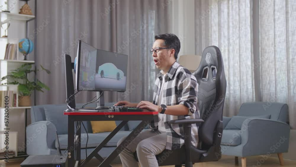 Side View Of Asian Male Automotive Designer Yawning While Working On 3D Model Of Ev Car On The Desktop Computers At Home
Side View Of Asian Male Automotive Designer Yawning While Working On 3D Model Of Ev Car On The Desktop Computers At Home