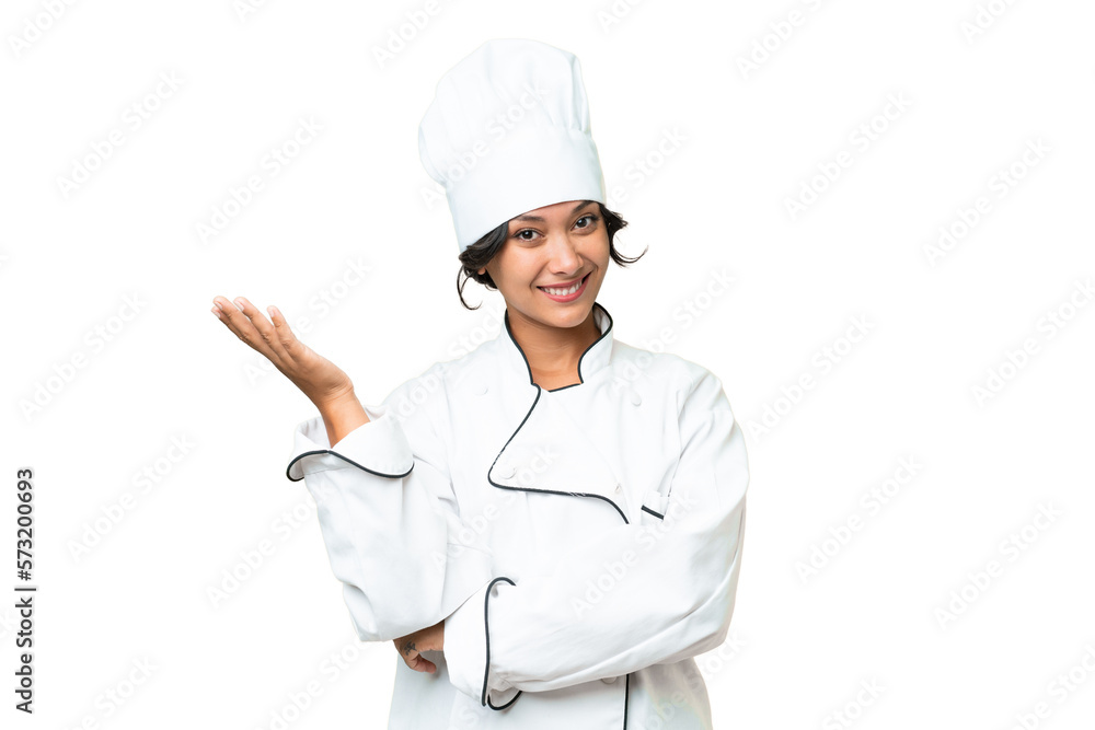 Young chef Argentinian woman over isolated background extending hands to the side for inviting to come