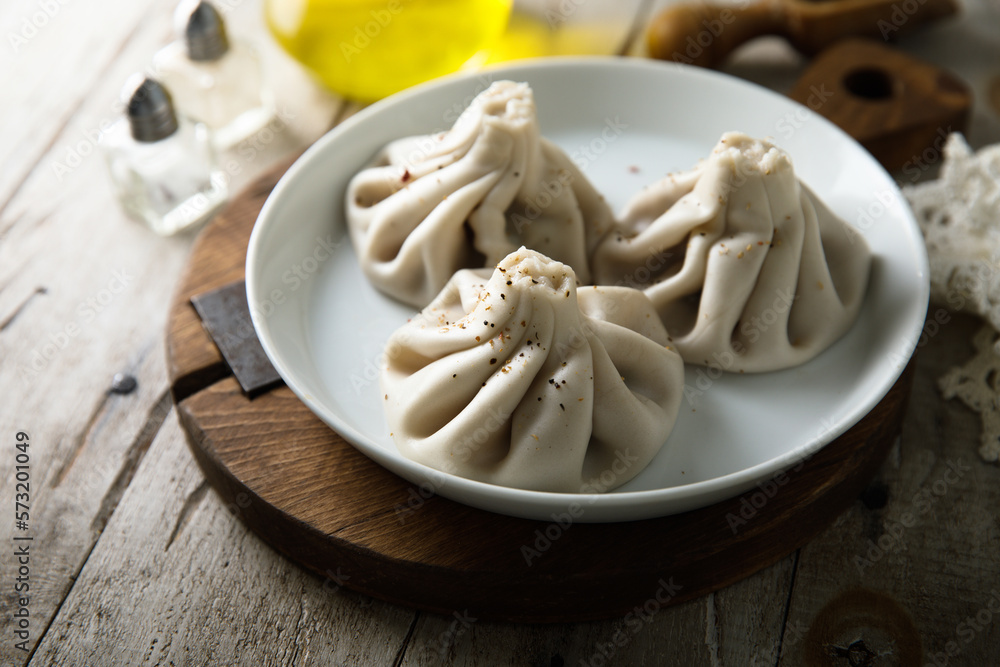 Traditional Georgian dumplings with black pepper Traditional Georgian dumplings with black pepper