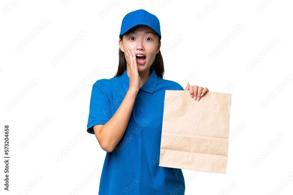 Young Asian woman taking a bag of takeaway food over isolated background with surprise and shocked facial expression Young Asian woman taking a bag of takeaway food over isolated background with surprise and shocked facial expression