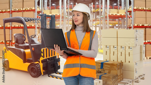 Warehouse manager woman. La...