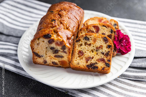 fruit cake sweet dessert dried fruit traditional pastry, nuts meal food snack on the table copy space food background rustic top view