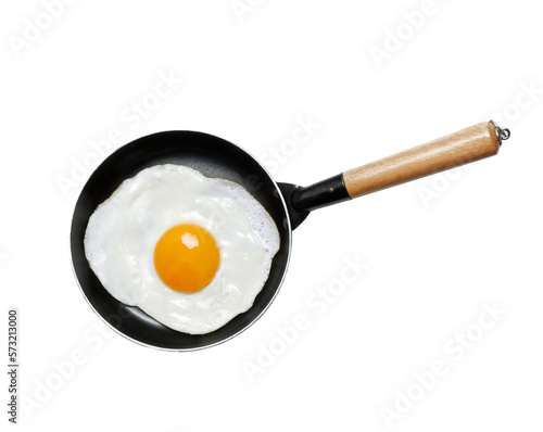 Fried egg yolk on frying pan isolated on transparent layered background.