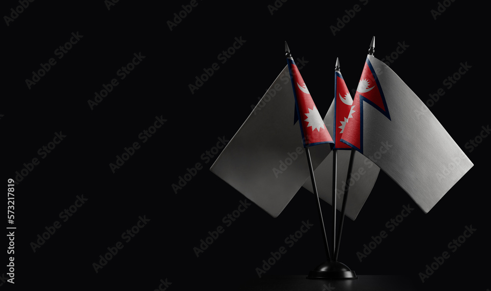 Small national flags of the Nepal on a black background Small national flags of the Nepal on a black background