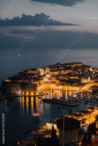 Iconic aerial view of Dubrovnik old town at dusk, creative edit, Croatia