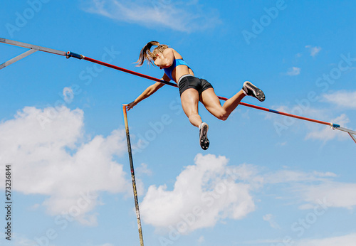 woman athlete pole vaulter successful attempt