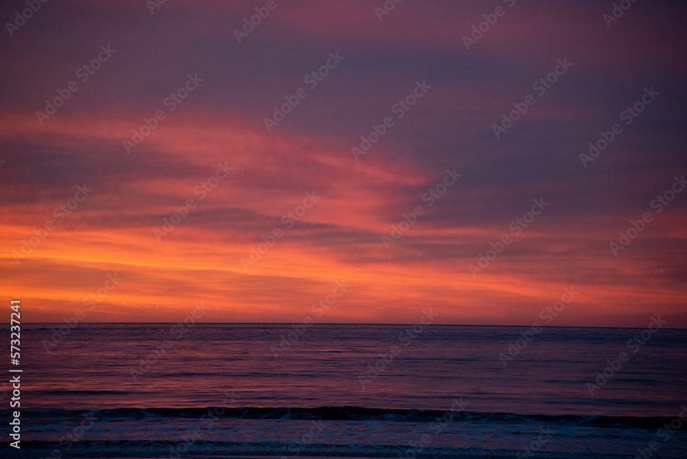 Dramatic Colorful Contrast Sunrise on Beach
