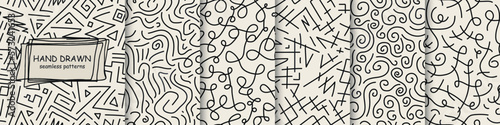 Collection of monochrome drawing seamless patterns - doodle style. Vector trendy beige unusual backgrounds. Textile endless prints
