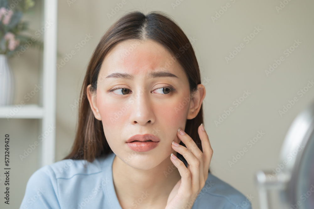 Dermatology, scratch asian young woman looking at mirror, expression