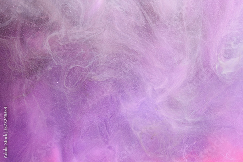 Lilac abstract ocean background. Splashes and waves of paint under water, clouds of interstellar smoke in motion