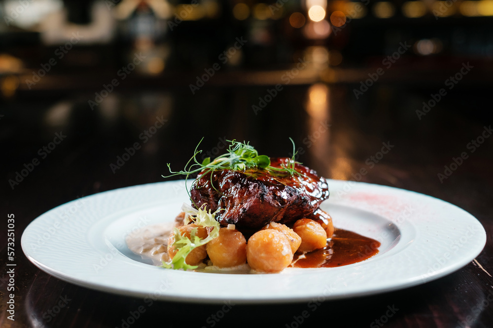 Steak grilled with potatoes and sauce. Steak grilled with potatoes and sauce.